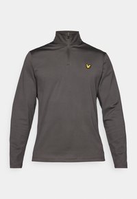 Grå langærmet pullover med halv-zip krave, der har et gult fuglelogo på venstre brystområde og et glat, struktureret stof.