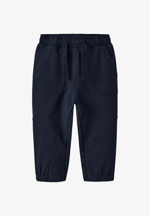Marineblauwe joggers gemaakt van soepele stof, met een elastische tailleband, trekkoorden en schuine zijzakken met elastische boorden.