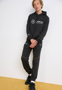 Puma Teplákové kalhoty - puma black