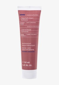Korres Petal Soft Cream Exfoliator i en 150 ml tub, med en dämpad rosafärg, vit text och ett texturerat vitt lock.