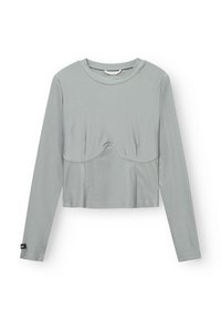 Long-sleeve cropped top in light gray fabric. Features a round neckline and a subtle curved seam detail on the front for added design.