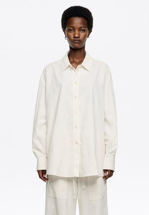 Blusa - marfil
