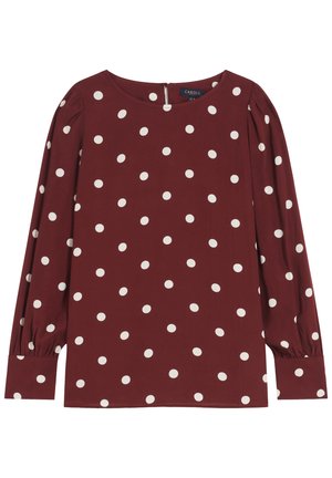 Bordeauxblouse met witte stippen, lange pofmouwen, ronde halslijn en een rits aan de achterkant. Glad stof met een ontspannen pasvorm.