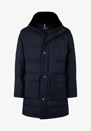 Marine blauwe pufferjas met een ritskraag, twee vo pockets, knoopsluitingen en een zachte bontvoering. Bevat een logo-detail op de mouw.