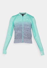 Langærmet zip-up jakke med et gradientdesign, der går fra lys teal til mørk blå. Lavet af tekstureret, letvægtsstof.