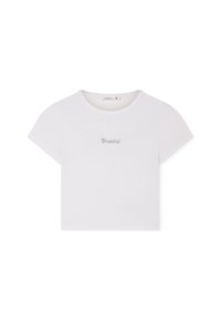 T-shirt bianca cropped in cotone, con maniche corte e scollatura curva. La parola "Grateful" stampata in azzurro chiaro.