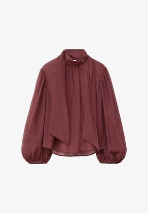 Burgundy blouse with a high neck, draped front, and voluminous puff sleeves; made from lightweight, textured fabric.