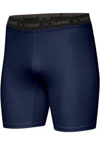 Marina blå idrottsshorts med texturerad panel och elastisk midja med "hummel"-logotyp. Slät tygkvalitet och kroppsnära design.