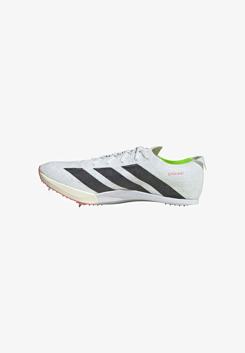White athletic shoes featuring black stripes, textured upper material, green collar interior, and spiked outsole. Accented with "STRUNG" logo.