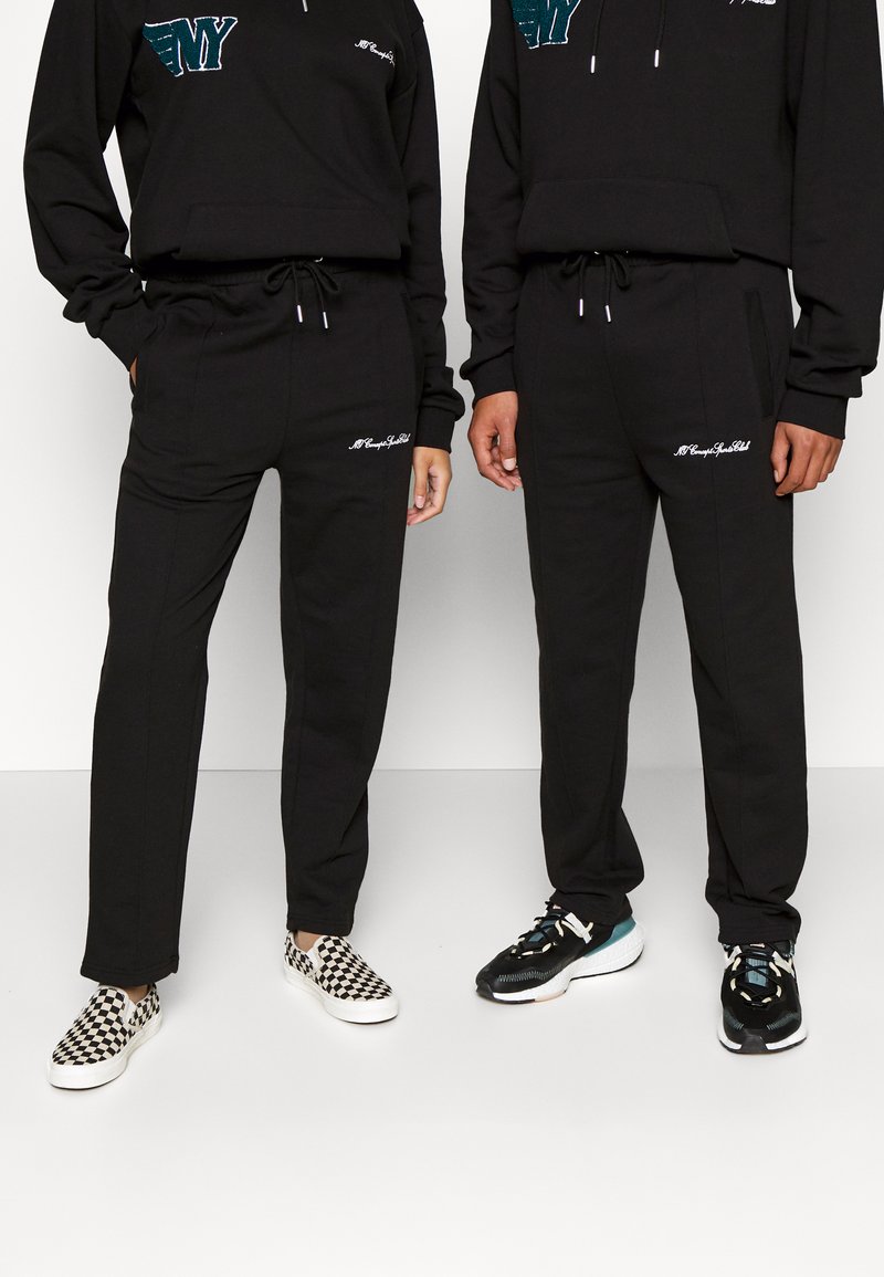 NY CONCEPT UNISEX Tracksuit bottoms black Zalando.de