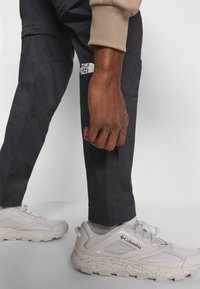 The North Face EXPLORATION TAPERED CONVERTIBLE  - Outdoor trousers - black
