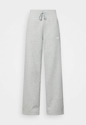 Gray sweatpants with an elastic waistband, drawstring detail, and a small white Nike logo on the left thigh. Soft fabric, loose fitting.