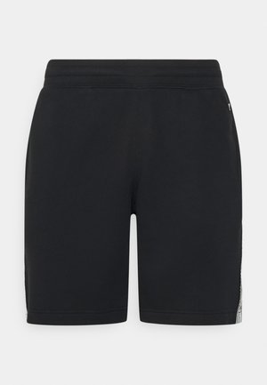 Black athletic shorts made of smooth fabric, featuring a stretchy waistband and side stripes with a subtle pattern. No pockets visible.