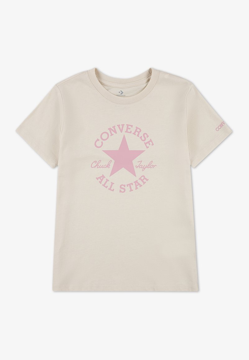 Kremna bombažna majica s kratkimi rokavi, ki ima roza zvezdasti logotip z napisoma "CONVERSE" in "ALL STAR" ter okroglo ovratnico.