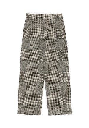 Czarno-białe spodnie w kratę o teksturowanej powierzchni, z szerokimi nogawkami i wysokim stanem. Tkanina prezentuje różnorodne wzory.