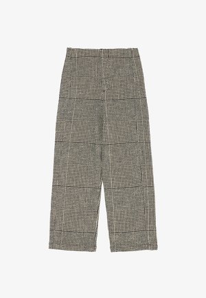 Črno-bele hlače s karo vzorcem in teksturirano površino, z širokimi hlačnicami in visokim pasom. Tkanina prikazuje različne vzorce.