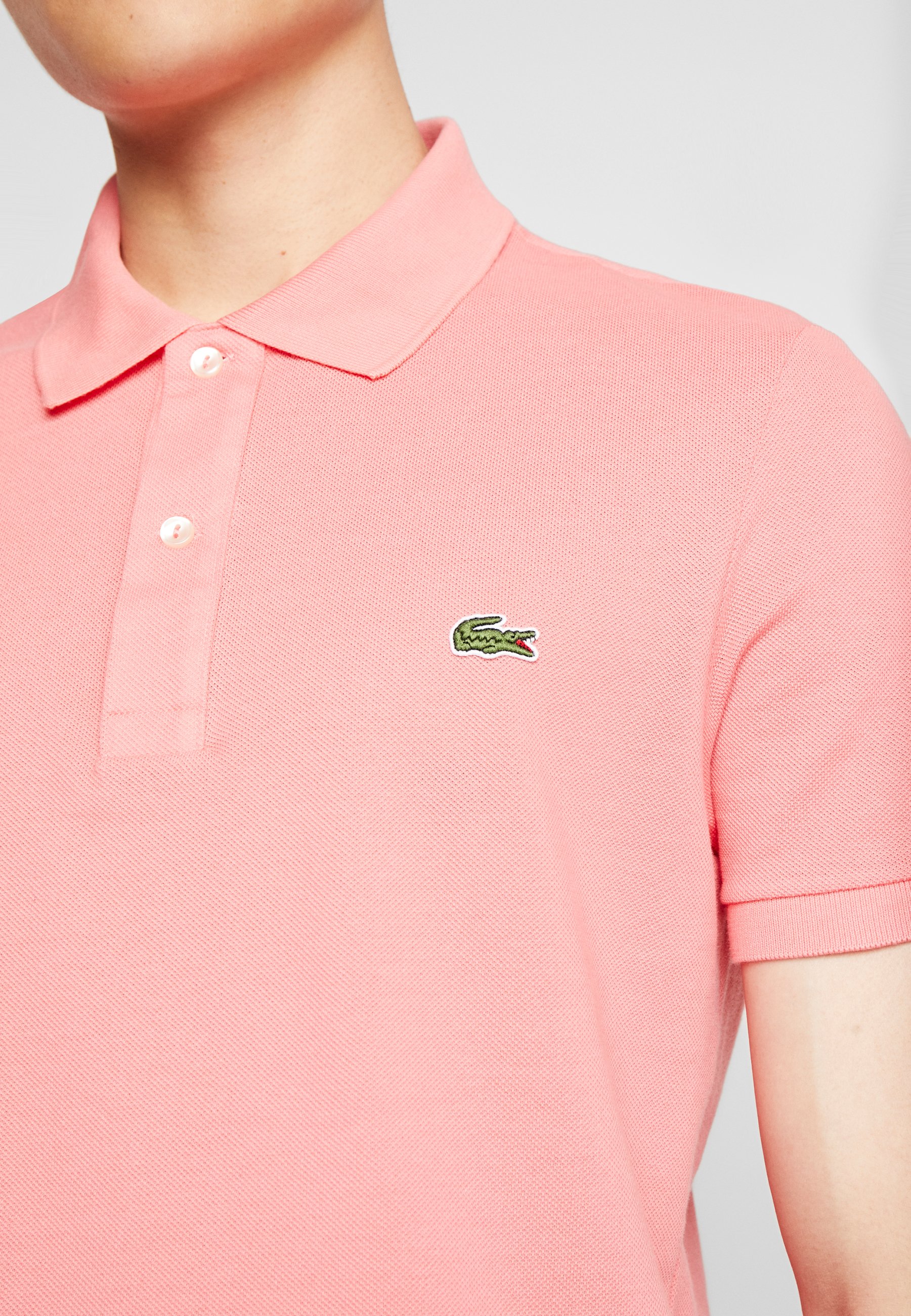 polo lacoste corail