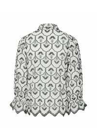 Witte stoffen blouse met ingewikkelde zwarte bloemenborduursels, een verhoogde kraag en gebloemde manchetten met een gegolfde zoom.