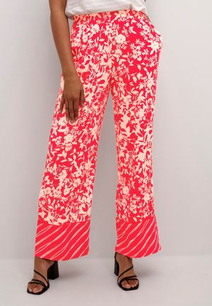 Floral-print wide-leg trousers feature a bright pink and cream color scheme, with an elastic waistband and striped hem accents.
