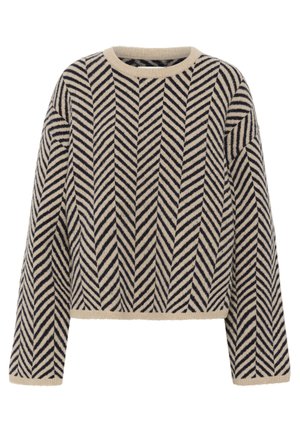 Beige knitted sweater featuring a navy herringbone pattern, ribbed neckline, and cuffs. Cropped length with long, slightly wide sleeves.