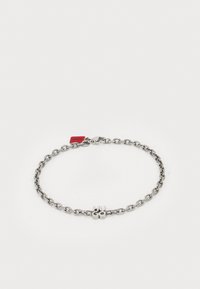 Seleccionado, silver-coloured