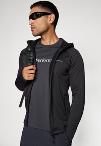 Peak Performance FLO CHILL LIGHT ZIP HOODY - Felpa con zip - black