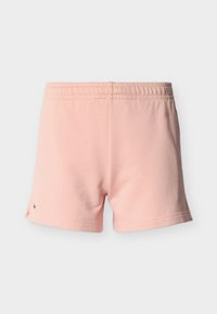 Shorts en coton rose avec une ceinture élastique et des fentes latérales. Présentent un petit logo vert sur l'ourlet et une texture lisse et douce.