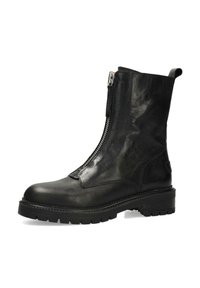 Zwarte leren enkellaars met een gladde textuur, voorzien van een zijrits, ronde neus en een dikke, getextureerde zool voor grip.