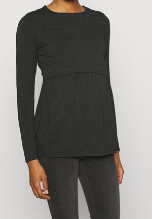 Long-sleeve, dark gray top with a fitted bodice and gathered hem, made of soft fabric, featuring a round neckline and simple design.