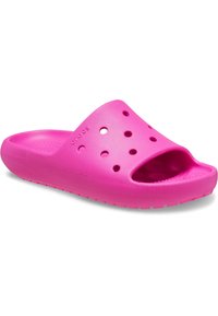 Sandal in schiuma rosa con punta aperta, grandi fori circolari per la ventilazione, suola testurizzata e finitura liscia.