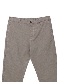 Pantalon à motif carreaux noir et blanc, avec une fermeture à bouton, des passants de ceinture et deux poches latérales. Fabriqué en tissu léger.