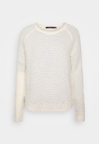 Pull en maille crème avec un motif texturé, col rond, poignets et ourlet côtelés. Coupe régulière avec manches longues.