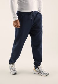 Pier One - Tracksuit bottoms - dark blue Thumbnail Image 1