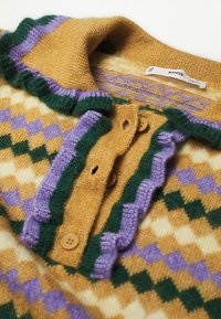 Mango Neule - mustard yellow