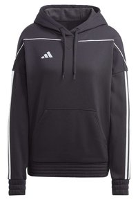 Zwarte hoodie van zacht materiaal met een voorkleedzak, witte strepen langs de mouwen en een capuchon met trekkoord. Heeft ribbels aan de onderkant en de manchetten.