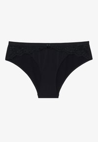 Completo nero con pizzo lungo la cintura, un piccolo fiocco decorativo sul davanti e un tessuto liscio ed elasticizzato.