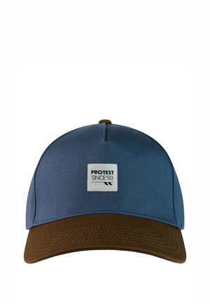 Blue and brown baseball cap with a white patch on front reading "PROTEST SINCE '93" against a white background.
