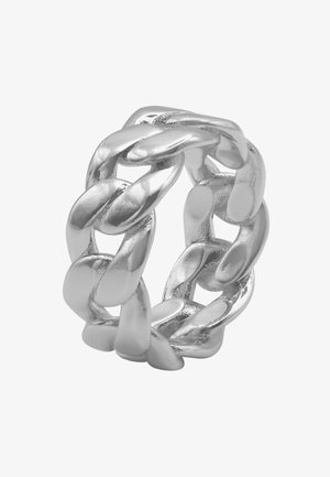 Dicke Silberkette-Ring mit ineinandergreifenden Gliedern und polierter Oberfläche, die glatte Texturen und eine markante, skulpturale Form hervorhebt.