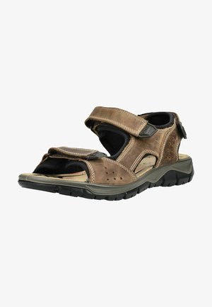 Brauner und schwarzer Outdoorsandal mit verstellbaren Klettverschlüssen und dicker Gummisohle, entworfen für Komfort und Langlebigkeit.