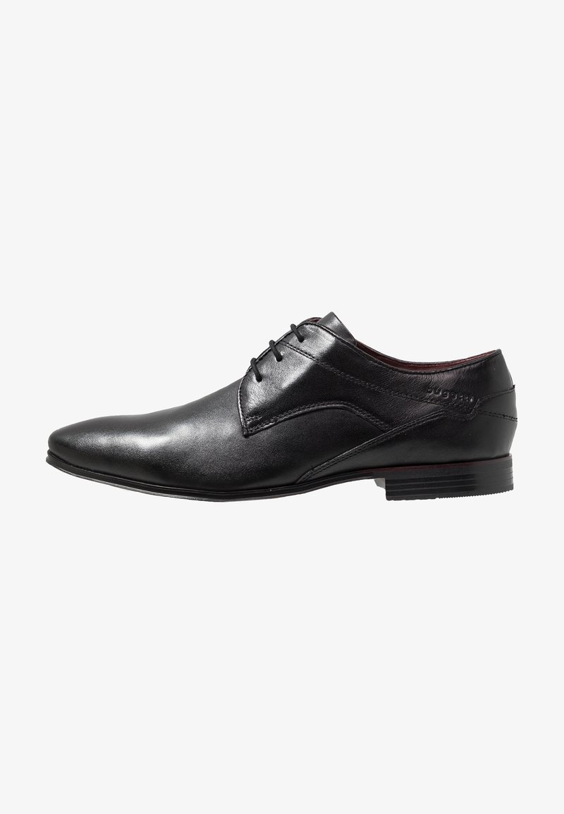 Chaussure habillée homme en cuir noir, bout pointu, fermeture à lacets, talon bas et détails de couture subtils.