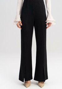 Touché Privé SLIT DETAILED - Hlače - black