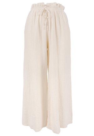 Wide-leg, cream-colored pants with a textured, crinkled fabric. Features an elastic waistband with a drawstring for adjustable fit.