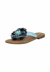 Denim-Flip-Flop-Sandale mit einem dunkelblauen Blumenakzent, hellblauem Riemen und einem braunen strukturierten Fußbett mit flacher Sohle.