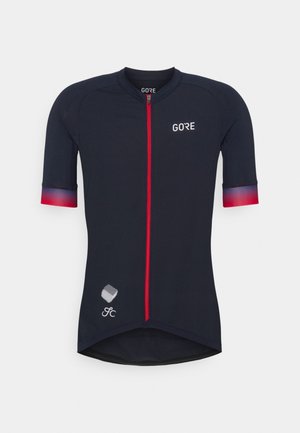 Marineblauw fietsjersey met korte mouwen, rode rits aan de voorkant, verloop van rode en paarse mouwboorden en wit Gore-logo op de borst.
