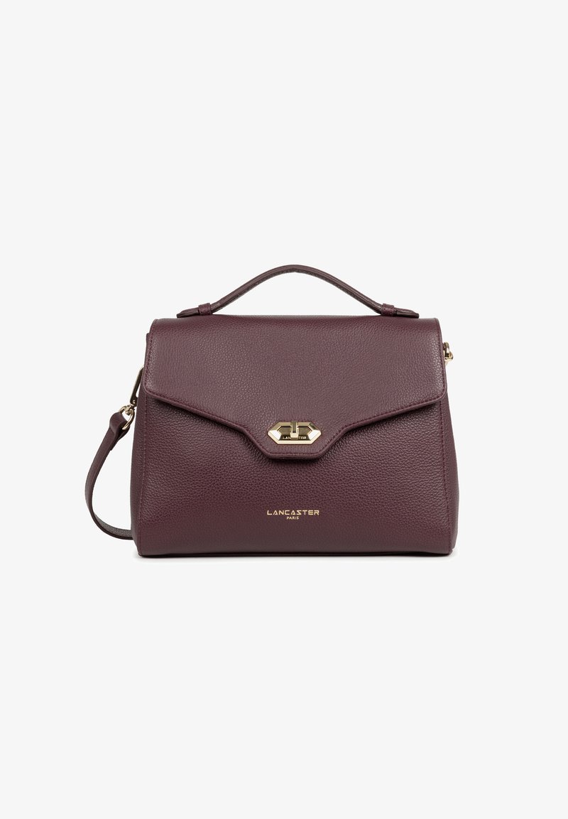 Borsa a mano in pelle viola scuro con manico superiore, chiusura a torsione dorata, tracolla rimovibile e logo "Lancaster Paris" in lettere dorate.