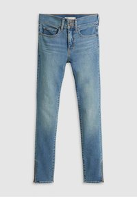 Jeans de mezclilla azul claro con un corte ajustado, que cuentan con bolsillos delanteros y traseros, un cierre de botón y dobladillos con cremallera. Textura suave con un ligero desvanecimiento.