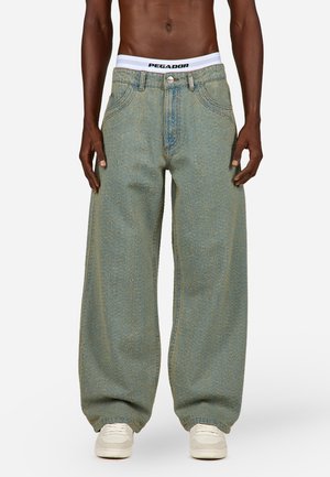 MENTON PILLED - Avar lõikega teksad - vintage blue