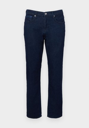 Mörkblå denimjeans med rak bendesign, har fem fickor, en framknäppning och subtil blekning på tyget.