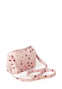 Růžová crossbody taška s kulatým tvarem, vyrobená z hladkého materiálu, s vzorem srdíček v různých odstínech červené a bílé. Zapínání na zip.