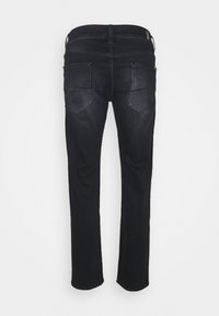 Mustat denim-farkut suoralla lahjemallilla, joissa on kaksi takataskua ja hienovaraiset haalistumat. Sileä pinta ja tukeva vyötärönauha.